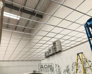 Metal grid framework for suspended ceiling installation in a large commercial space